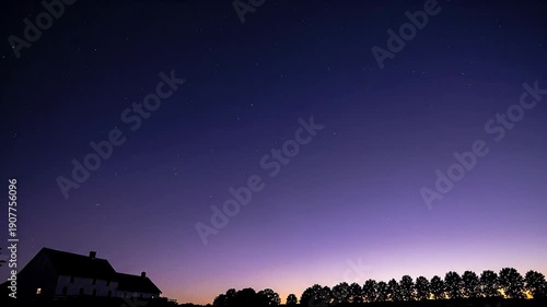 Rural farmhouse silhouette under a deep twilight sky, calm evening mood with fading sunset glow, peaceful countryside horizon for travel and nature themes
