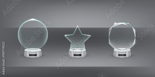 Set of modern transparent glass trophy awards for corporate business achievement ceremony prize presentation success recognition leadership excellence event display