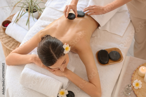 Young woman getting massage...