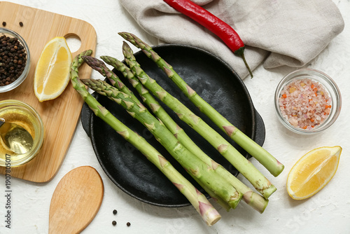 Frying pan with fresh green...