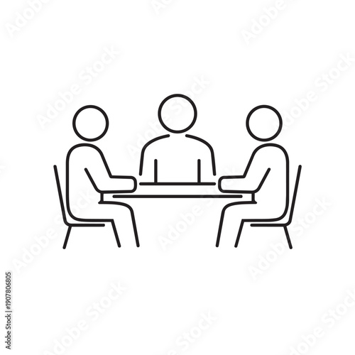 Three people sitting around a rectangular table in a meeting or discussion setting