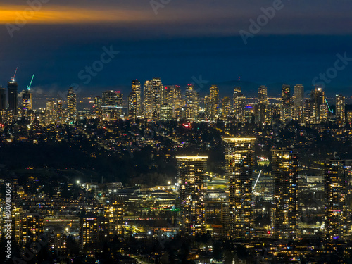 Wallpaper Mural Vibrant Night Skyline Of A Modern City With Tall Buildings And Glowing Lights Over Burnaby Torontodigital.ca