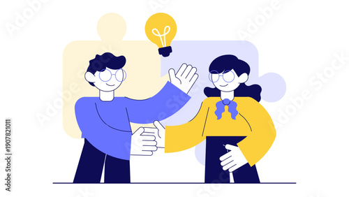 Two young entrepreneurs shaking hands and collaborating to find a creative solution for a business challenge