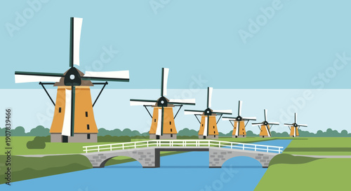 Iconic Dutch windmills stand in a row beside a tranquil canal, crossed by an elegant stone bridge.