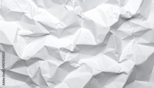 High-quality texture of a heavily crumpled white sheet of paper with distinct folds, shadows and organic relief, suitable for backgrounds and design projects.