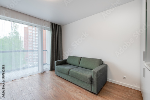 Wallpaper Mural Modern Living Room with Large Windows and Green Sofa in Bright Interior Torontodigital.ca