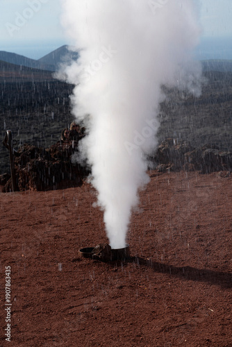Lanzarote volcanic landscape with geyser steam, Timanfaya national park, Canary islands, Spain