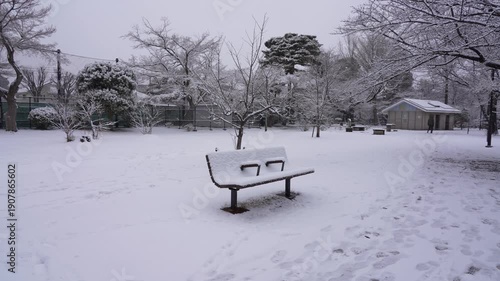 Wallpaper Mural Snow Falling Over a Peaceful Park in Tokyo City Torontodigital.ca