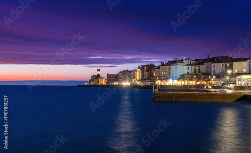 Wallpaper Mural A colorful sunset over the coastline of the historic old town of Piran in Slovenia Torontodigital.ca