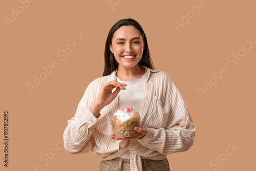 Happy young woman with swee...