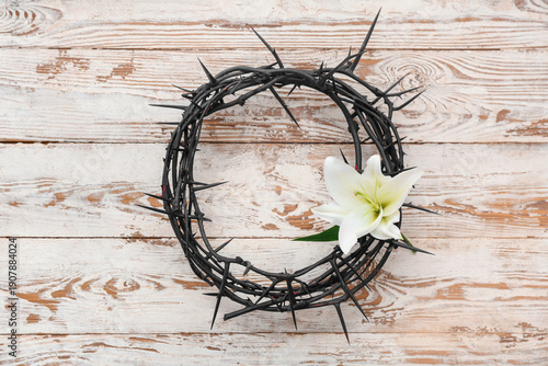Crown of thorns with lily o...