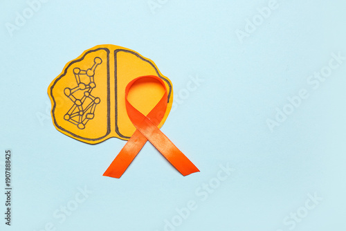 Paper brain and orange ribb...