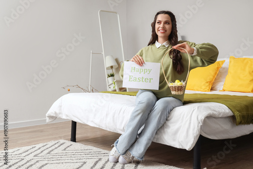 Young woman holding card wi...