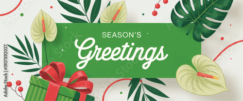 Seasonal Greetings card with gift box, leaves, and festive decorations on a decorated background viewed from directly above