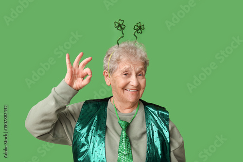 Senior woman in headband sh...