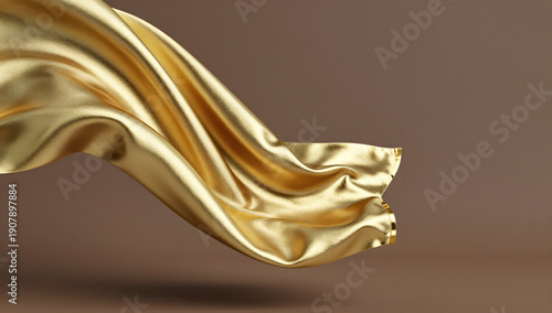 Golden Fabric in Motion: A luxurious piece of golden fabric gracefully floats and swirls against a soft, muted backdrop, creating an ethereal and elegant visual.