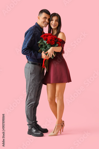 Young engaged couple with b...