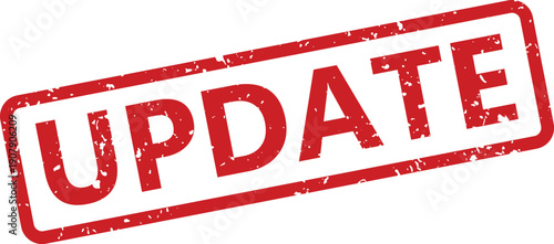 A vibrant red distressed update message rubber stamp presented on a crisp white surface