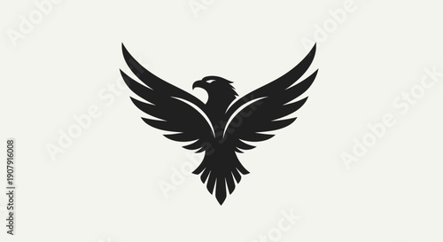 Black eagle silhouette with wings spread against a white background