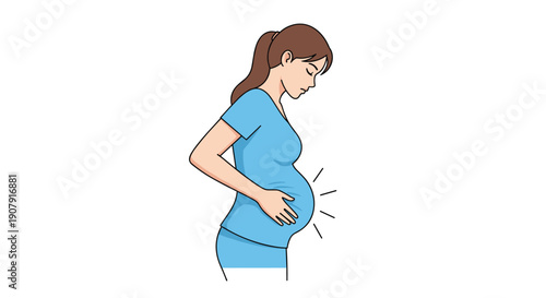 Pregnant woman in a blue outfit looks down at her growing belly with a gentle expression indicating the joy of upcoming motherhood.