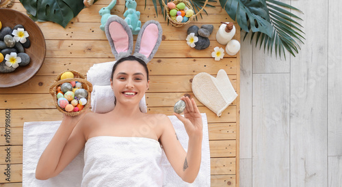 Young woman with bunny ears...