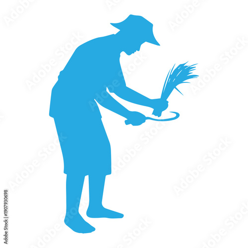 farmer harvesting rice