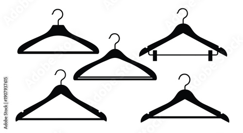 Collection of five different black silhouette garment hangers displayed against a white background