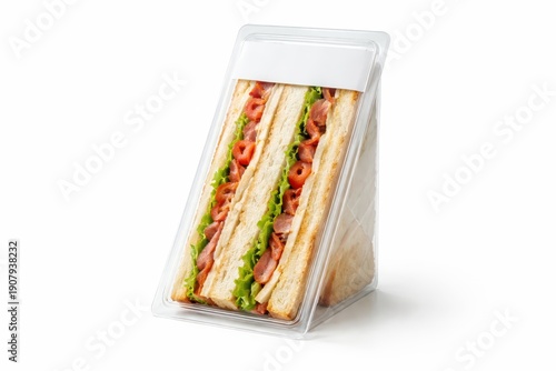 Club sandwich in clear triangle wedge clamshell sealed with blank tamper sticker fresh layered cross section chilled takeaway packaging high key studio isolated on white