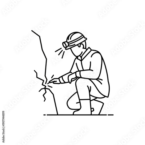 Safety inspector examining structural crack in rock wall with headlamp