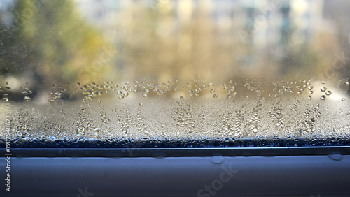 Water condensation inside the window due to low outside temperatures in winter in Transylvania.