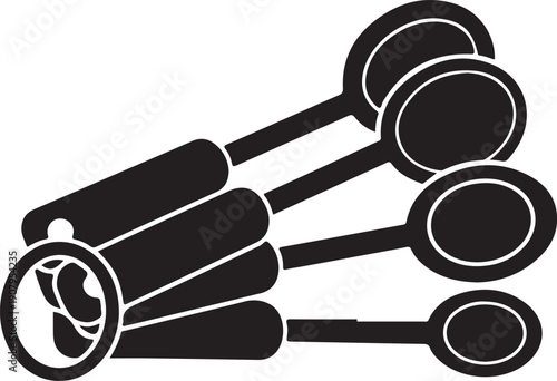 Black measuring spoons set on white background kitchenware cooking baking kitchen tools