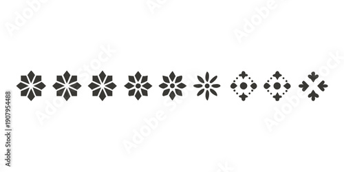 A row of intricate black and white floral patterns with varying designs