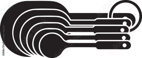 Set of black measuring spoons on a white background kitchenware cooking baking