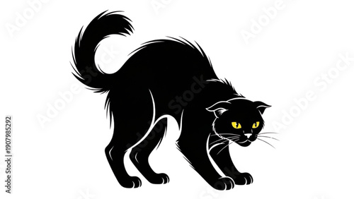 Black cat with yellow eyes crouching and stalking prey in a stealthy position