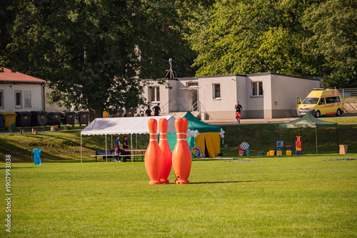 Colorful inflatable attractions providing fun and entertainment for children and adults at outdoor events.
