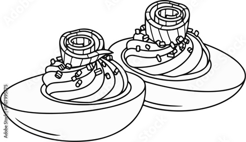 Two deviled eggs topped with swirling filling and rolled garnish