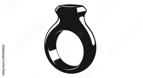 Black ring with shiny surface and geometric design on a white background.