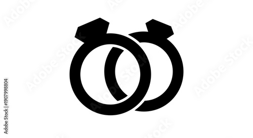 Two black wedding rings symbolizing eternal love and commitment.