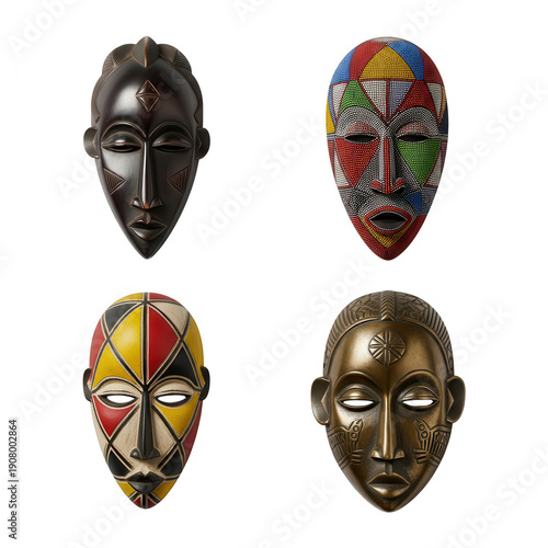 Collection of four diverse tribal masks from Africa, showcasing unique craftsmanship and cultural heritage