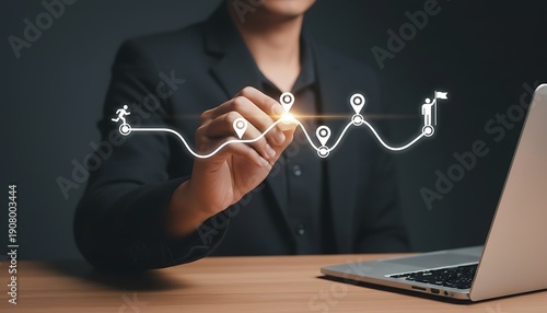 Businessman drawing a digital roadmap with pins and a goal flag, representing business strategy