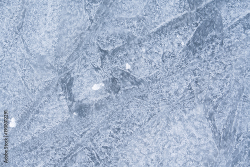 Fotografi Abstract texture of frozen sea water with ice crystals and cracks on the surface