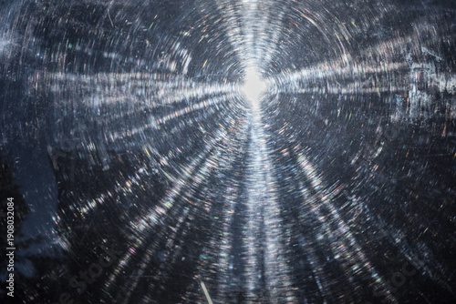 SUN - Sunlight seen through a scratched transparent surface