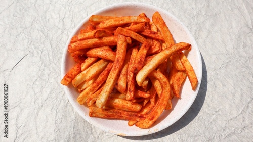 Foto Top view of French fries in plate with white background
