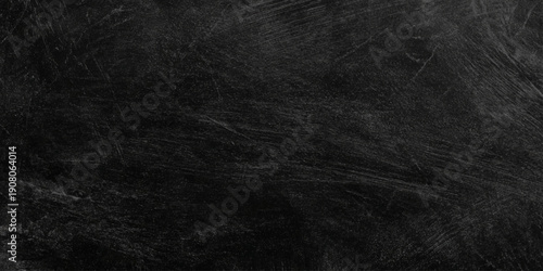 black and dark gray textured background featuring heavy distressing backdrop, empty, acrylic painted full frame background texture for web banner designs.