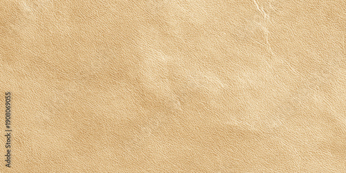 Light brown textured faux leather background with fine grain and natural pattern with soft highlights, making it ideal for luxury branding, upholstery background.