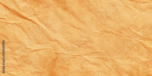 Crumpled brown paper texture close up with creases and vintage tones Uneven surface creates rustic feel, perfect for crafts or artistic layout.