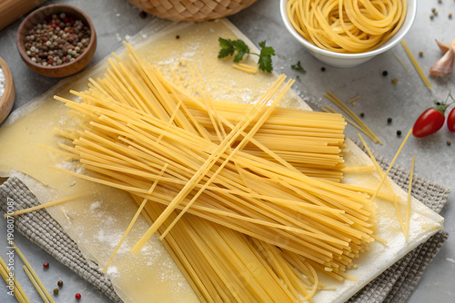 Uncooked Yellow Spaghetti Pasta Pile Texture