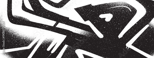 Abstract black and white graffiti art with bold lines and spray paint texture.