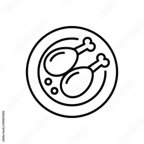 Two cooked chicken drumsticks served on.