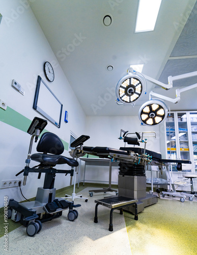 Canvas Print Modern operating room with surgical table and adjustable LED lights